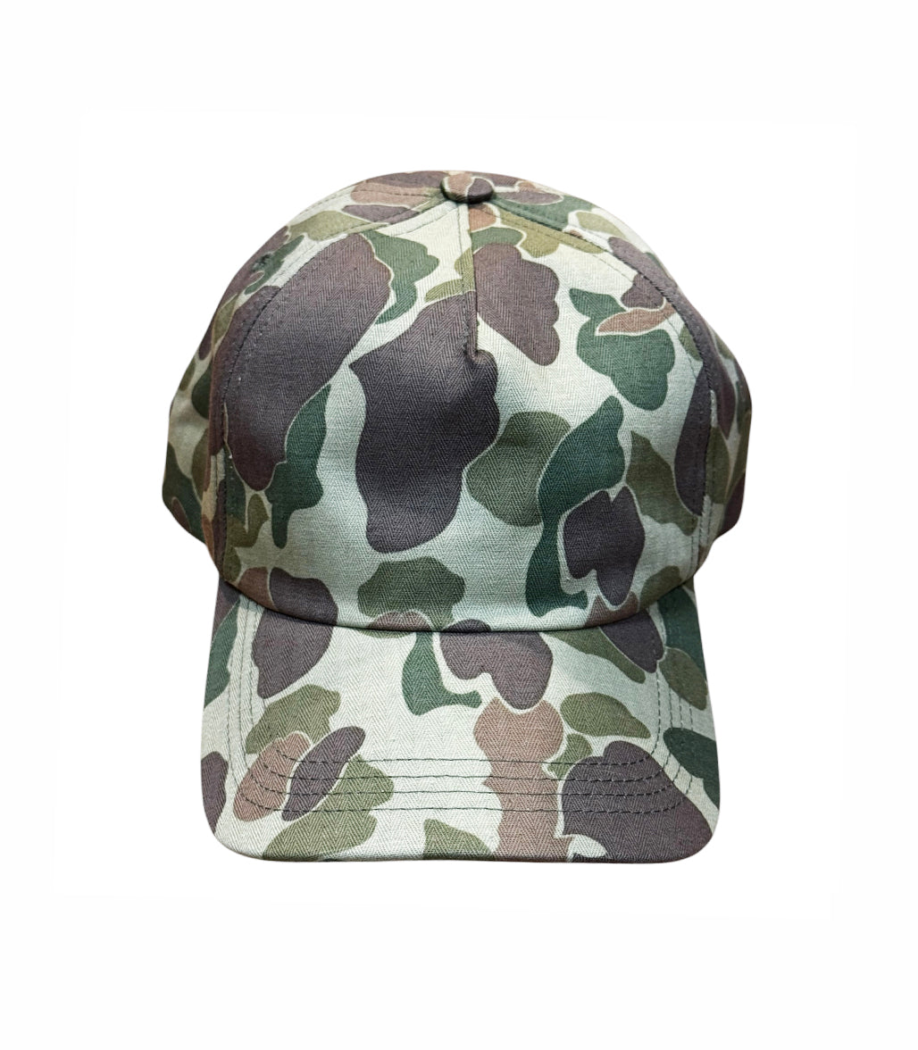 A classic six-panel baseball cap featuring a classic woodland camouflage pattern in green, brown, and beige, shown against a plain white background.
