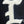 A close-up of a white embroidered letter 'I' patch on a black fabric background.